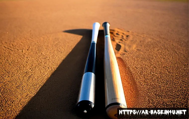 야구 배트 소재 비교  나무 vs 알루미늄 - Photorealistic side-by-side comparison of an unpainted wooden baseball bat and a polished aluminum b...